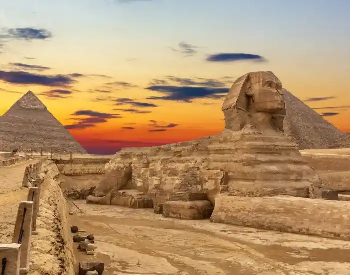 Great-Sphinx-Of-Giza-And-Pyramids-At-Sunset-EgyptaTours