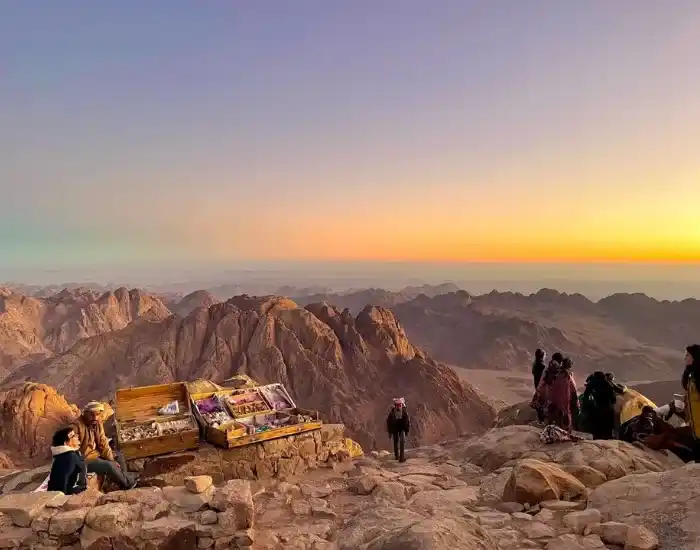 Tourists-Watching-The-Sunrise-From-The-Peak-Of-Mount-Sinai-EgyptaTours